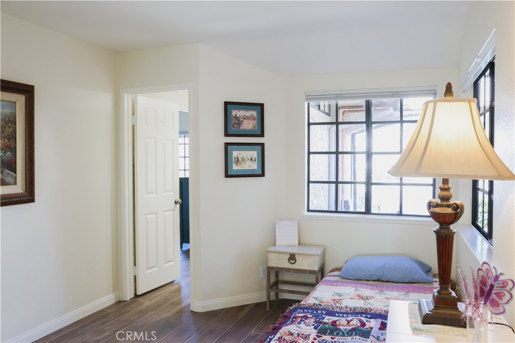 183 South Starflower Street Brea, CA 92821 - Photo 23 of 29 a bedroom with a bed and a window