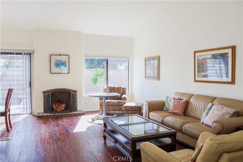 183 South Starflower Street Brea, CA 92821 - Photo 9 of 29 a living room with furniture and a fireplace
