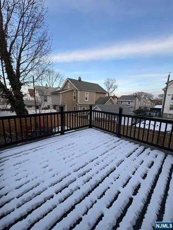 a view of a terrace with trees