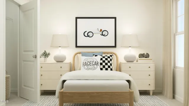 a bedroom with a bed and cabinet