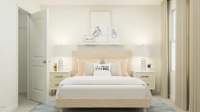 a bedroom with a bed and a night stand