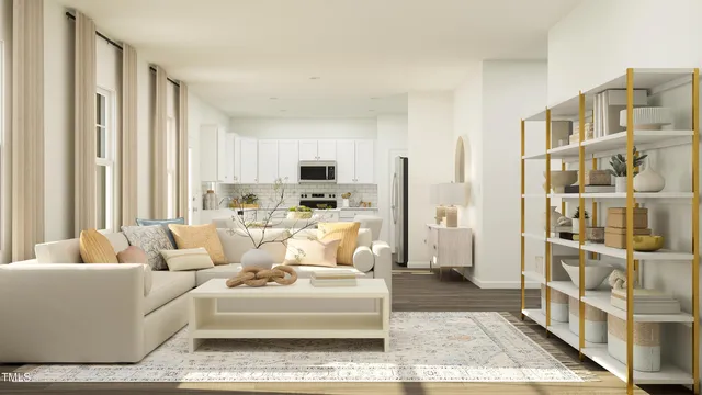 a living room with furniture fireplace and a window