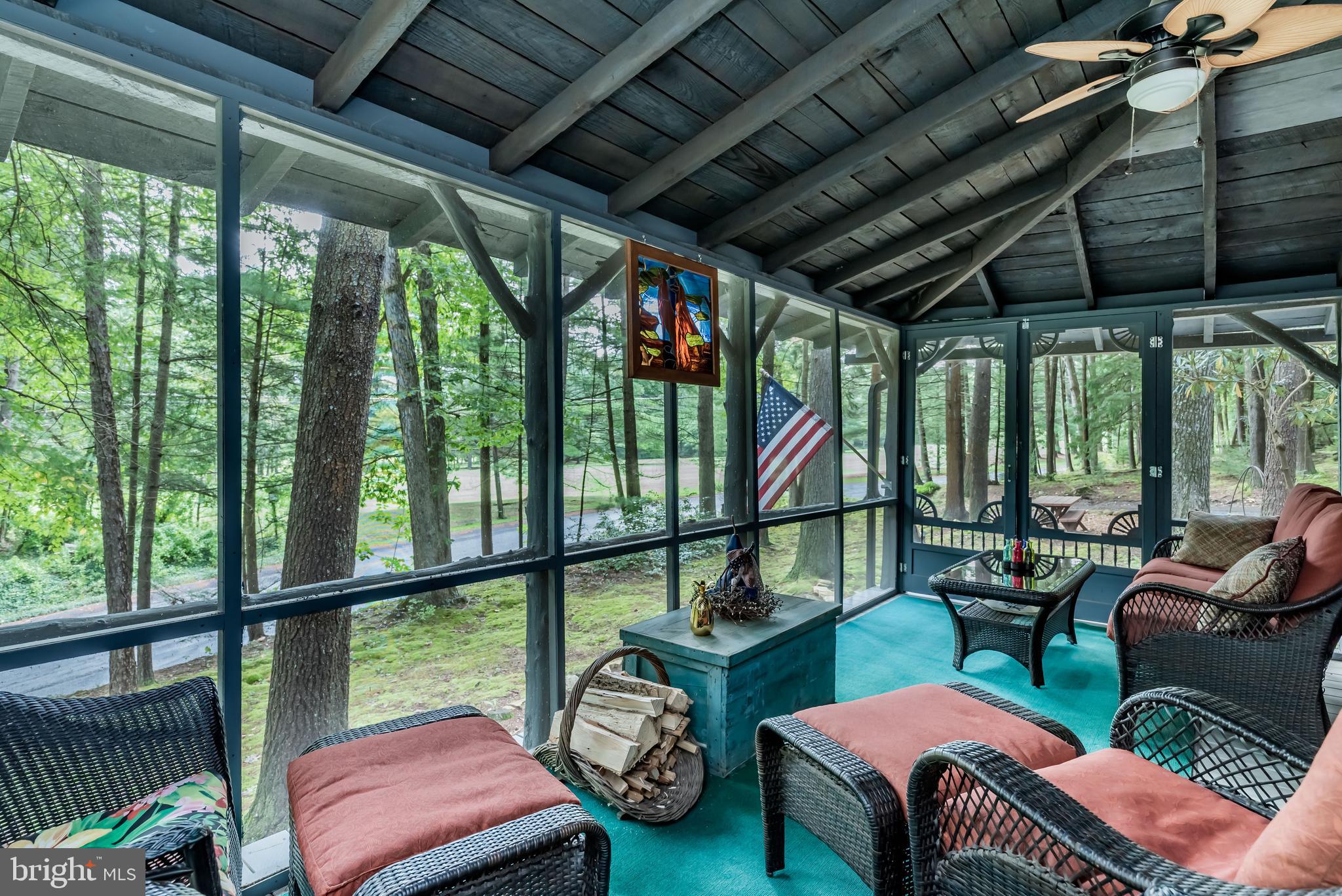 9648 Golf Course Road Fayetteville, PA 17222 - Photo 6 of 22 Screened Front Porch