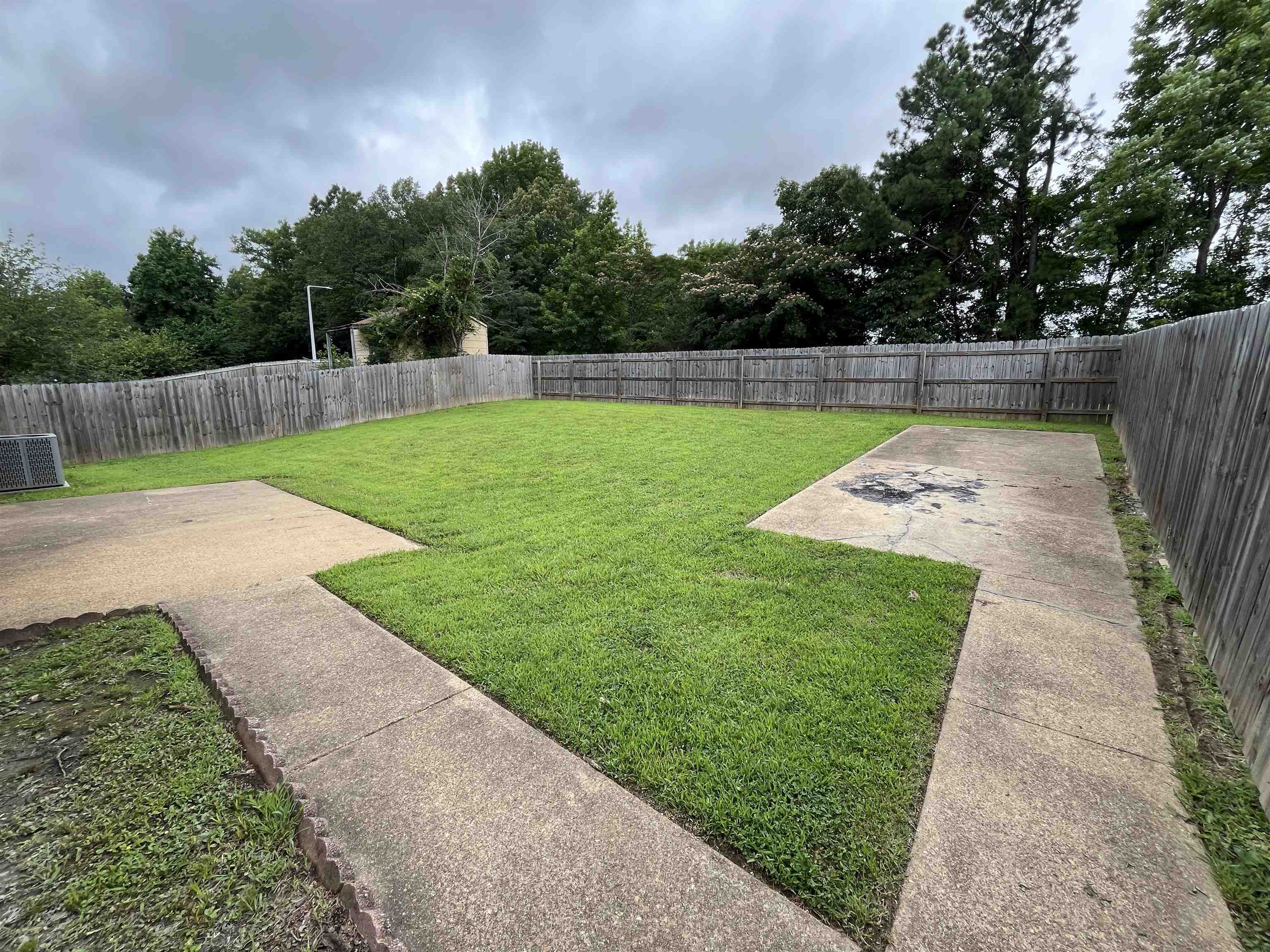 3016 Meadowfair Road Memphis, TN 38118 - Photo 13 of 17 Fenced backyard with a patio area