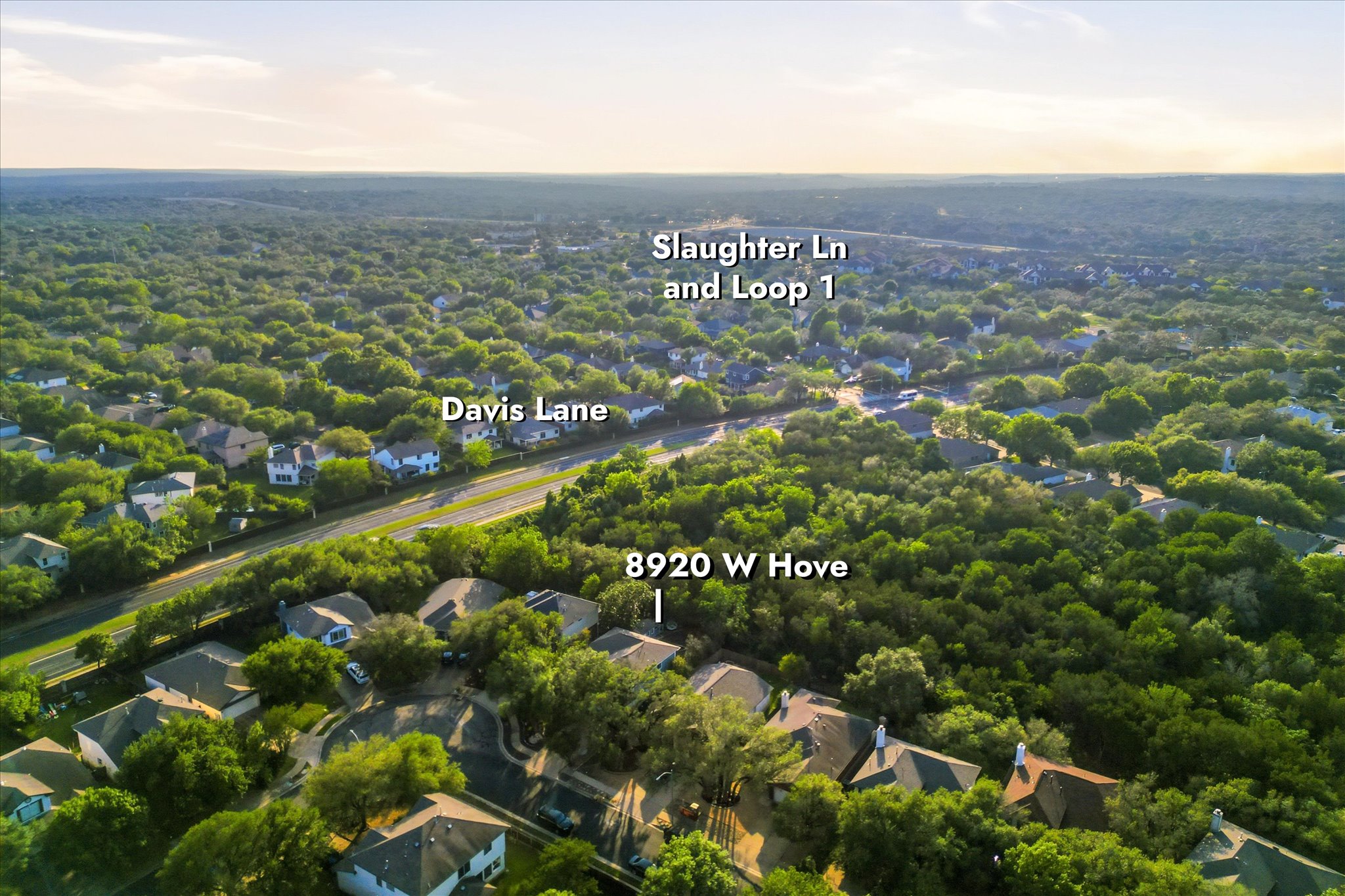 8920 West Hove Loop Austin, TX 78749 - Photo 26 of 39 Aerial perspective showcasing a residential area with dense green tree coverage, surrounded by additional homes and roads