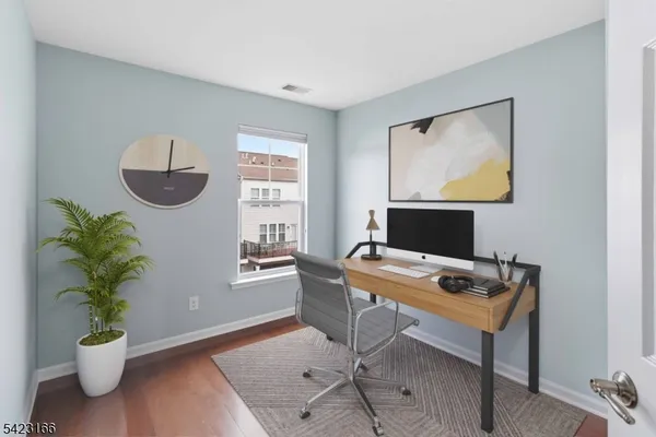 a workspace with furniture and window