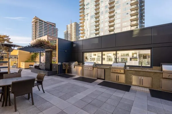 a dining room with furniture a rug and a large window