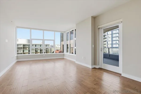 a kitchen with stainless steel appliances a refrigerator and a stove