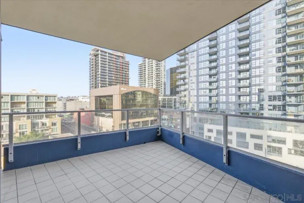 a view of a balcony with an ocean view