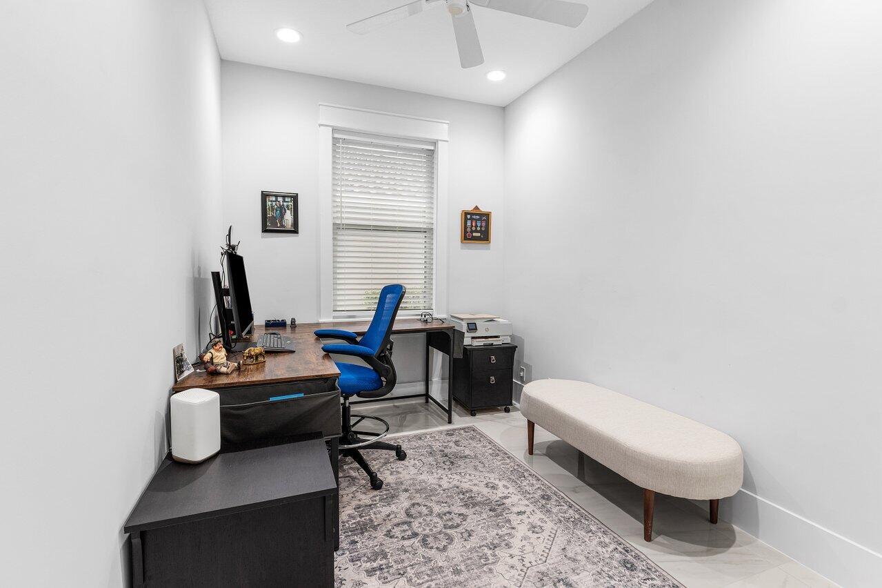 7320 Falls Road West Boynton Beach, FL 33437 - Photo 17 of 34 a view of a workspace with furniture