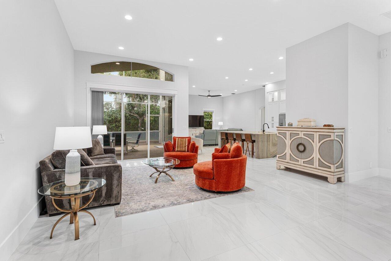 7320 Falls Road West Boynton Beach, FL 33437 - Photo 7 of 29 a living room with furniture and a large window