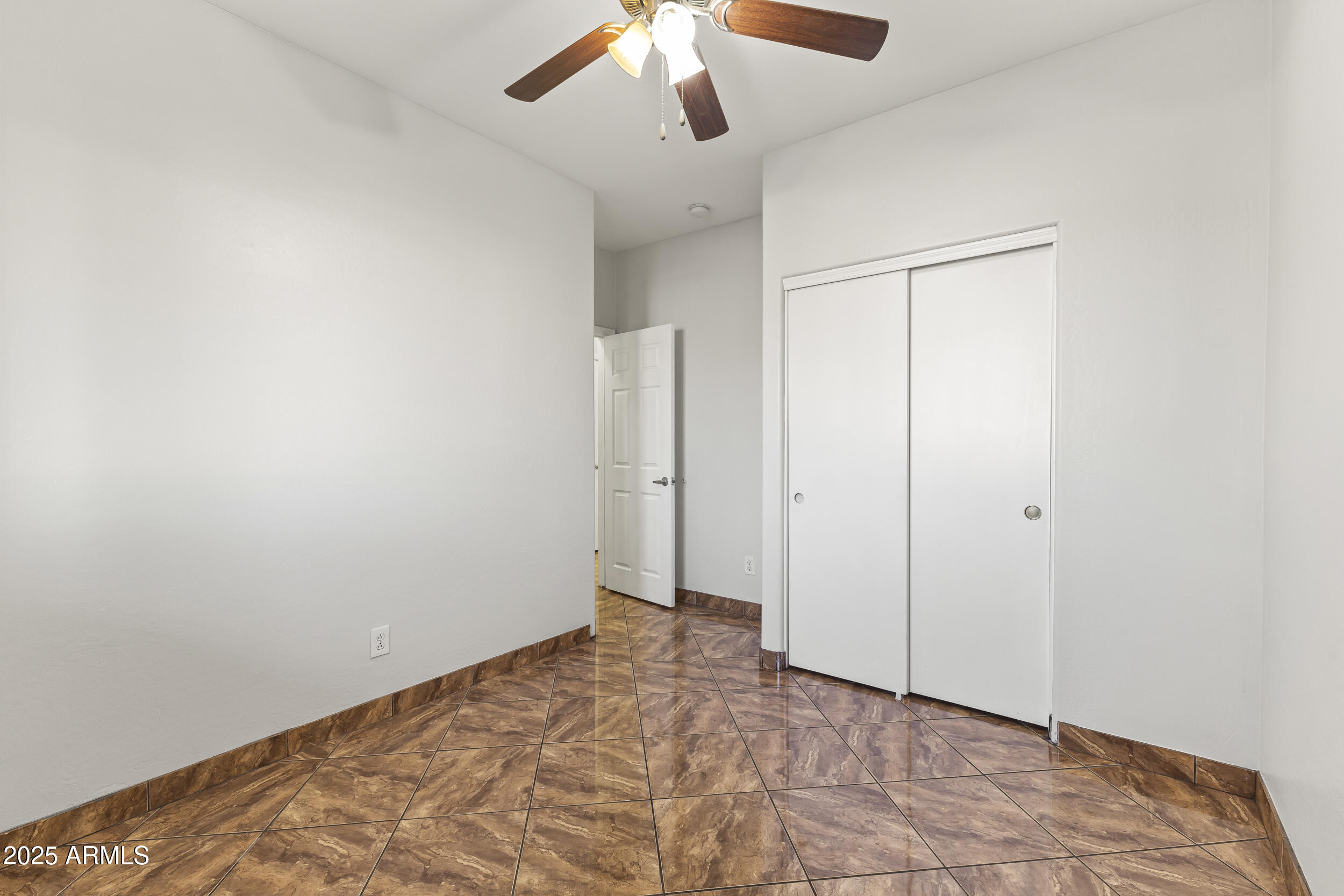 11185 West Coronado Road Avondale, AZ 85392 - Photo 14 of 46 a view of an empty room