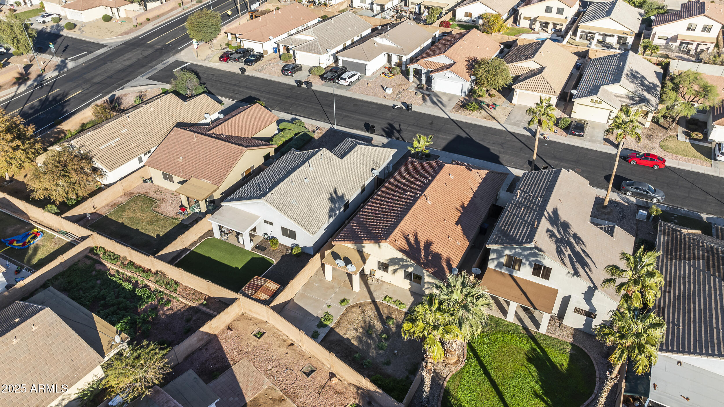 11185 West Coronado Road Avondale, AZ 85392 - Photo 42 of 46 an aerial view of residential houses with outdoor space