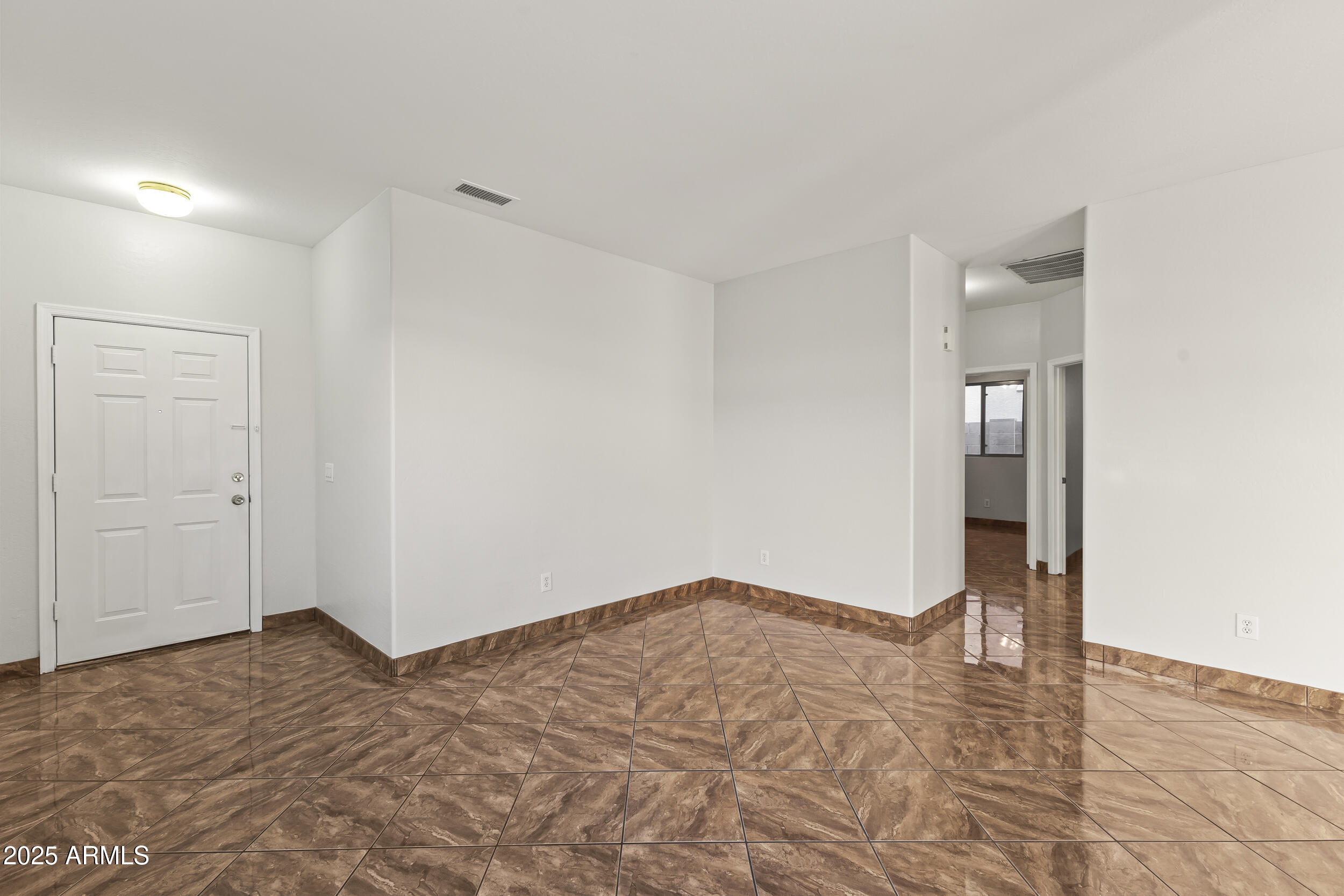 11185 West Coronado Road Avondale, AZ 85392 - Photo 6 of 46 a view of empty room