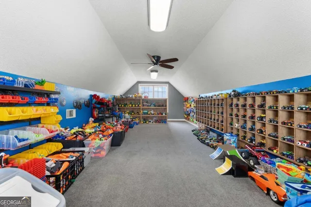 a view of a swimming pool with a yard