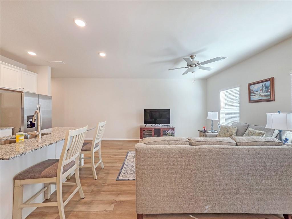 1120 Edinberg Drive Villa Rica, GA 30180 - Photo 11 of 35 a living room with furniture and a flat screen tv