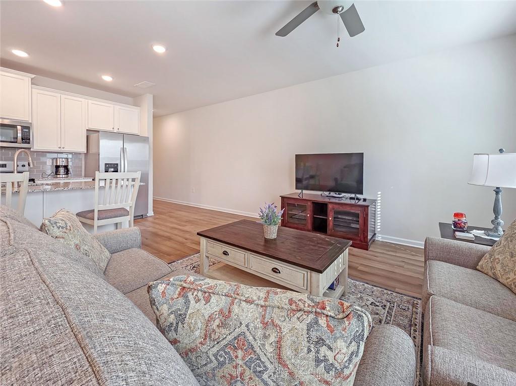 1120 Edinberg Drive Villa Rica, GA 30180 - Photo 12 of 35 a living room with furniture and a flat screen tv