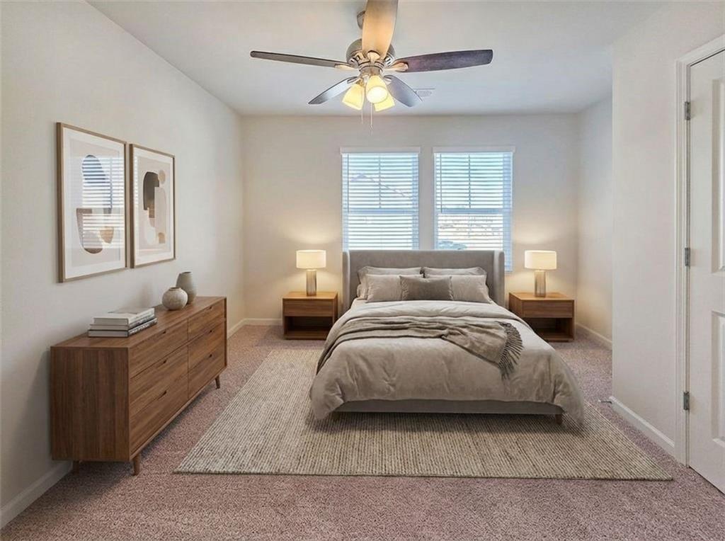 1120 Edinberg Drive Villa Rica, GA 30180 - Photo 26 of 35 a spacious bedroom with a bed and window