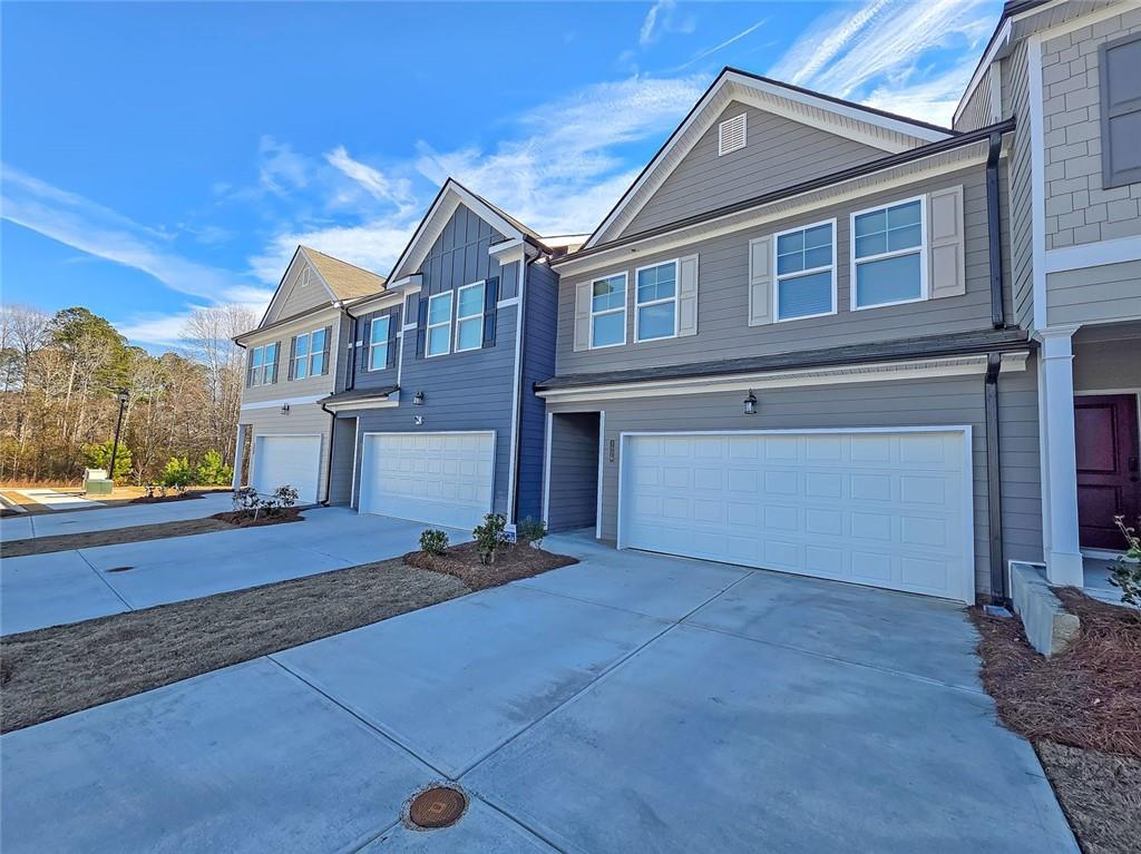 1120 Edinberg Drive Villa Rica, GA 30180 - Photo 4 of 35 a view of a house with a yard
