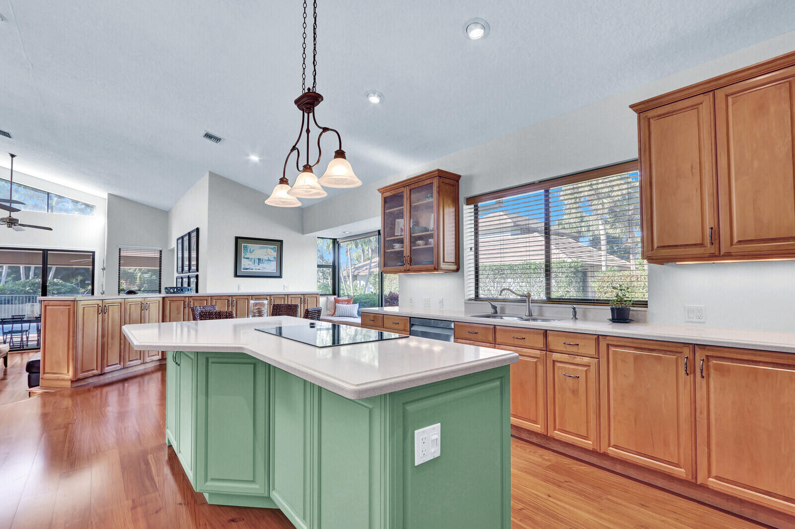 208 Turnberry Court South Atlantis, FL 33462 - Photo 11 of 44 Center Island w/cooktop and wall oven