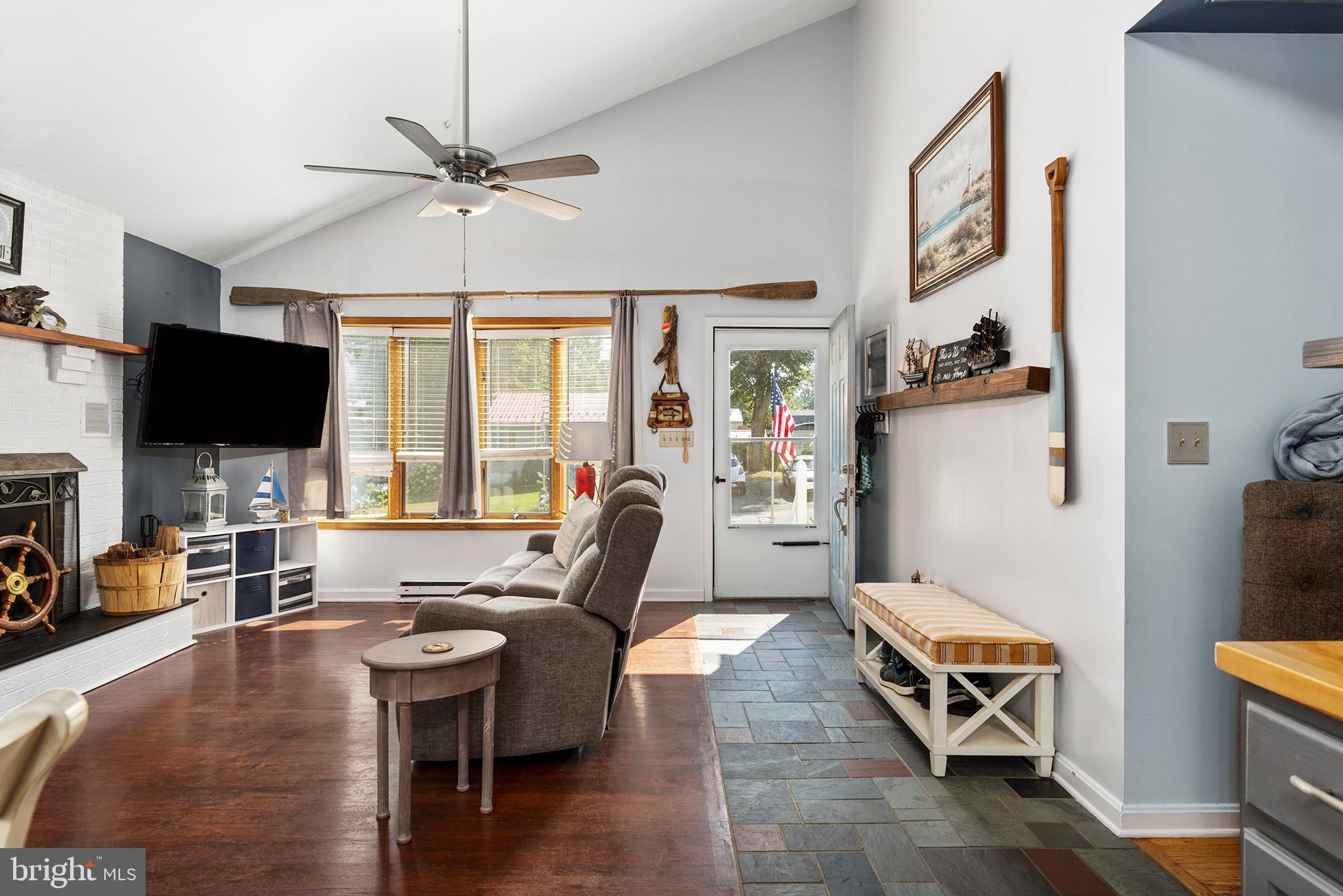 33 Low Road Earleville, MD 21919 - Photo 5 of 35 a living room with furniture and a flat screen tv