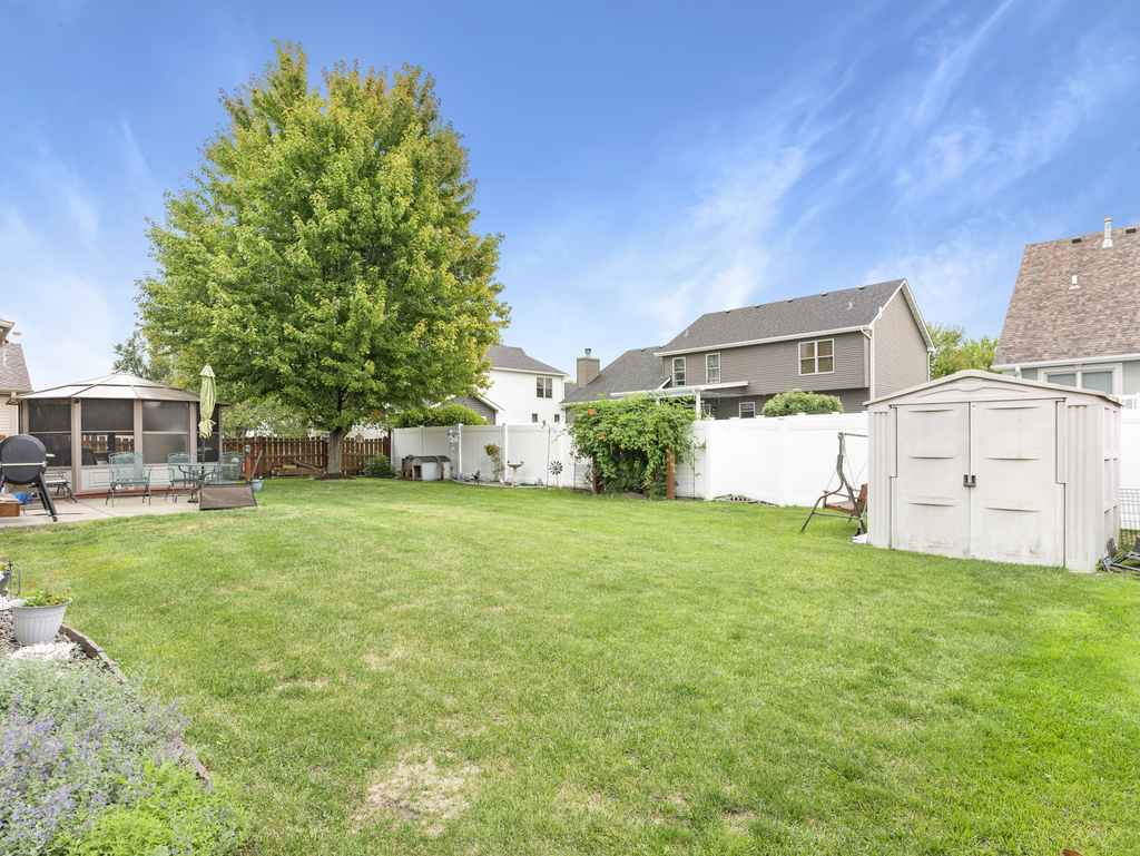 704 Clifford Drive Minooka, IL 60447 - Photo 23 of 25 front view of a house with a yard