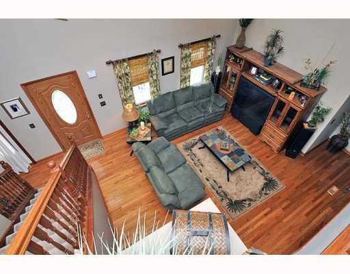 3116 Haberlein Road Gibsonia, PA 15044 - Photo 8 of 12 Den/Family/Great Room. The balcony from the upstairs hall overlooks the family room below with 17 ft ceiling.
