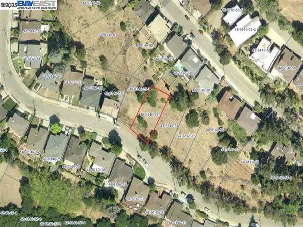 an aerial view of a city with lots of residential buildings