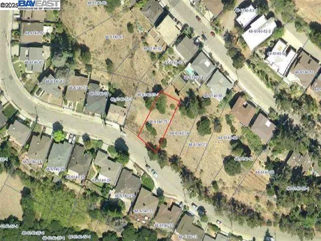 an aerial view of a city with lots of residential buildings