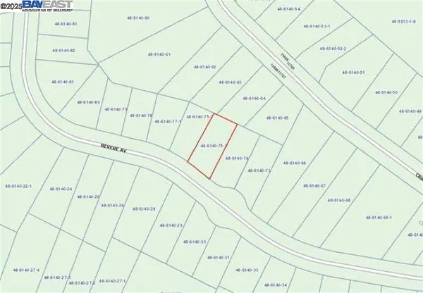 a view of a backyard of a house