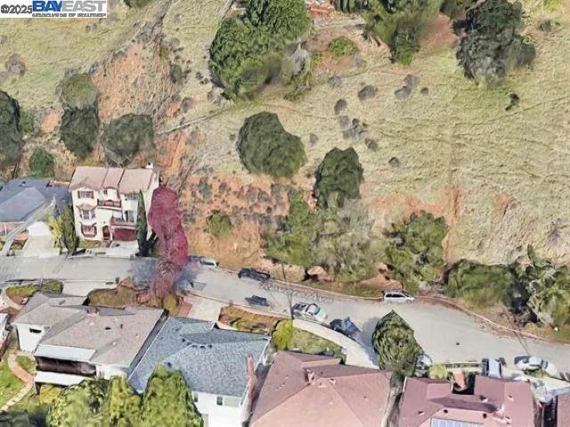 an aerial view of residential house with outdoor space