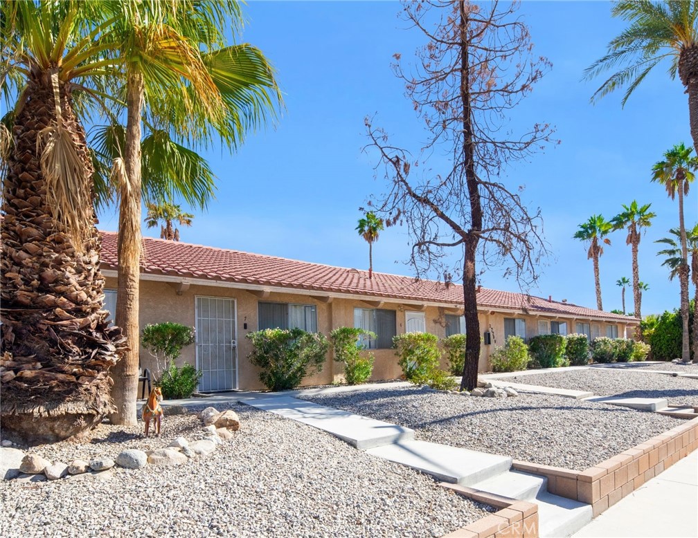 27700 Avenida Terrazo Cathedral City, CA 92234 - Photo 11 of 25 a view of a house with a tree in front