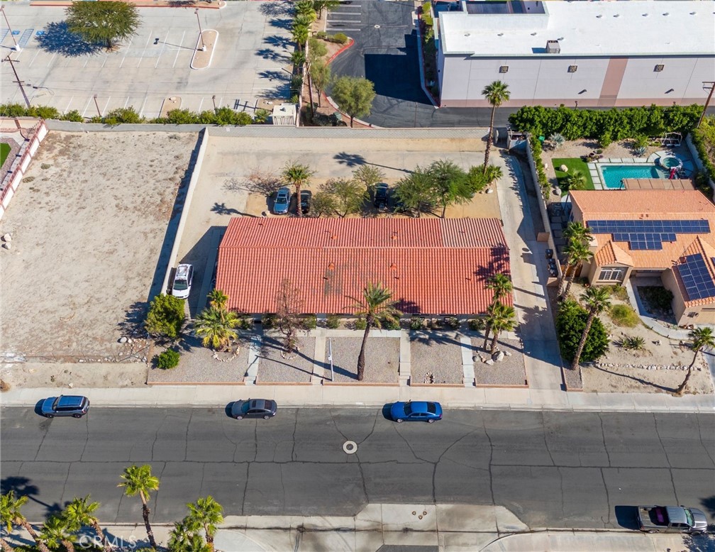 27700 Avenida Terrazo Cathedral City, CA 92234 - Photo 20 of 25 an aerial view of a house with a yard and large tree