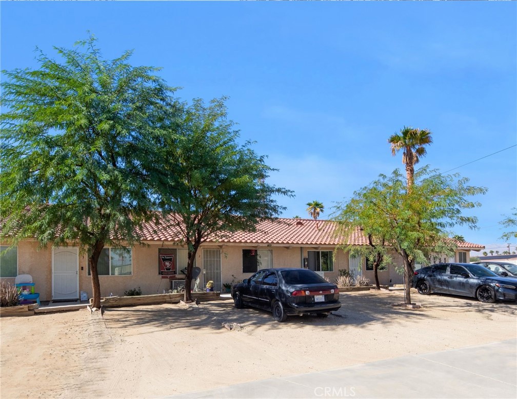27700 Avenida Terrazo Cathedral City, CA 92234 - Photo 4 of 25 a car parked in front of a building