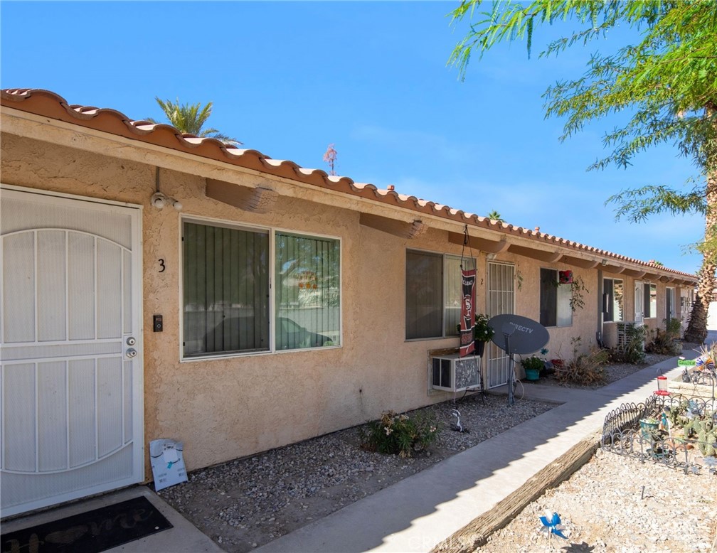 27700 Avenida Terrazo Cathedral City, CA 92234 - Photo 6 of 25 a view of house with chair and tables