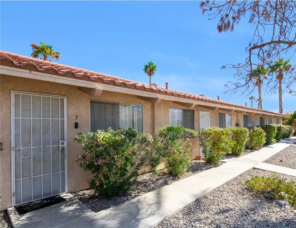 27700 Avenida Terrazo Cathedral City, CA 92234 - Photo 8 of 25 a front view of a house with a garden