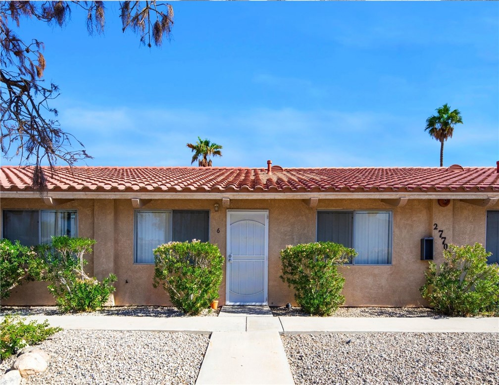 27700 Avenida Terrazo Cathedral City, CA 92234 - Photo 10 of 25 a view of a house with potted plants
