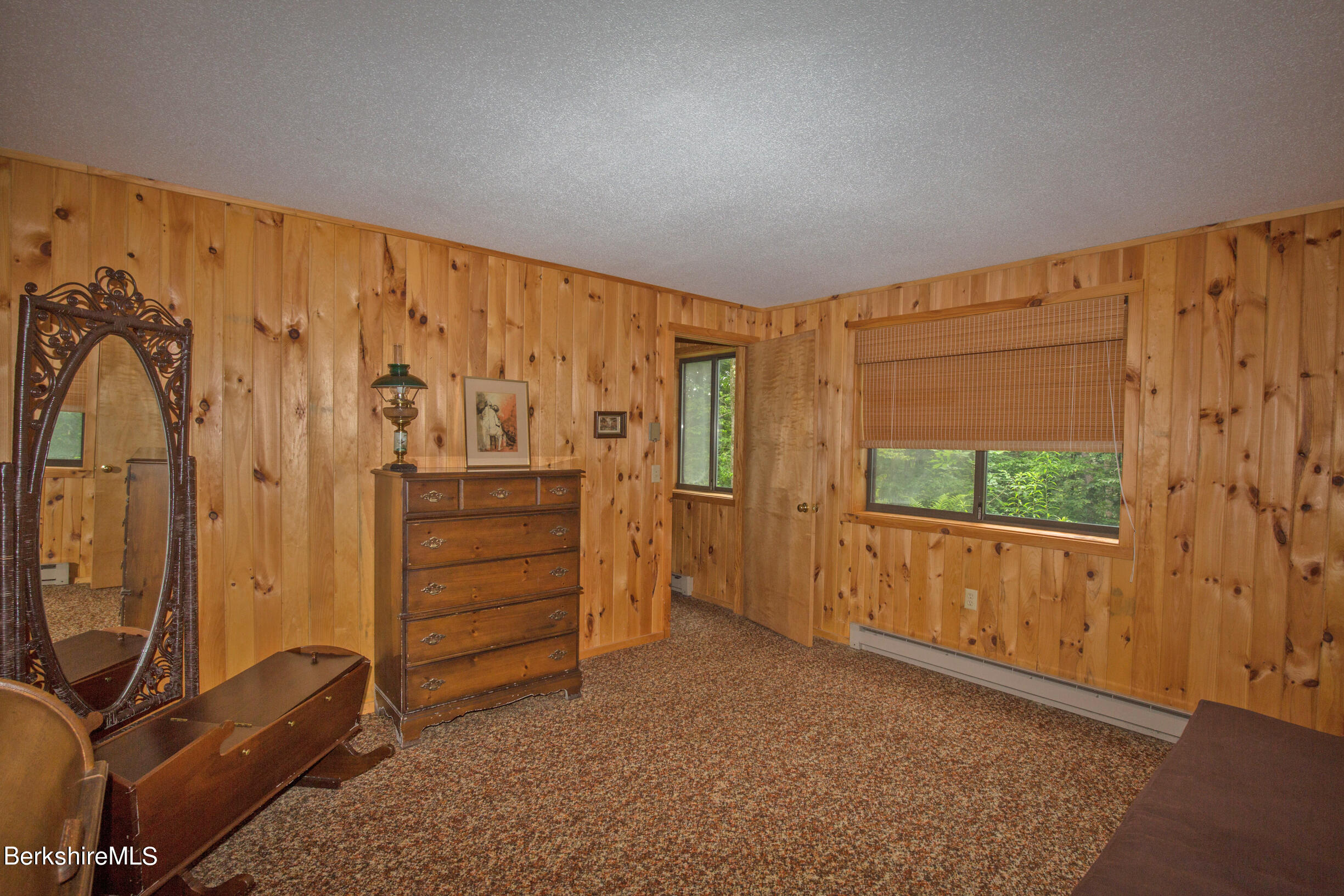 294 Tyringham Road Otis, MA 01253 - Photo 36 of 48 a view of a room with window and furniture