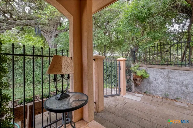 a bathroom with a toilet a sink and a mirror