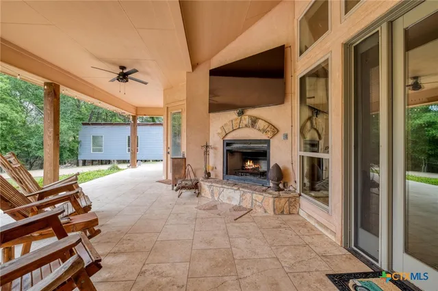 a view of a back yard of the house