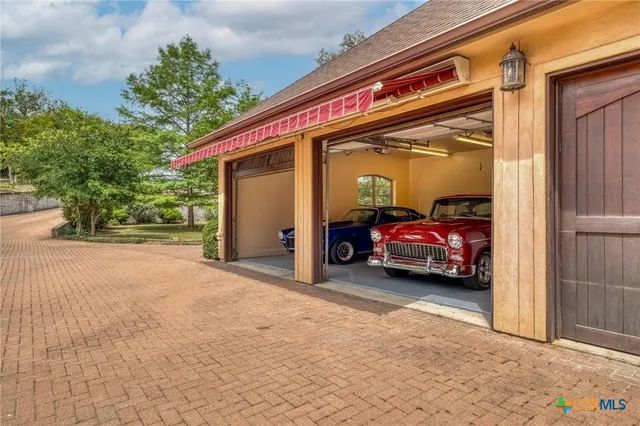 a view of a deck with wooden floor and fence