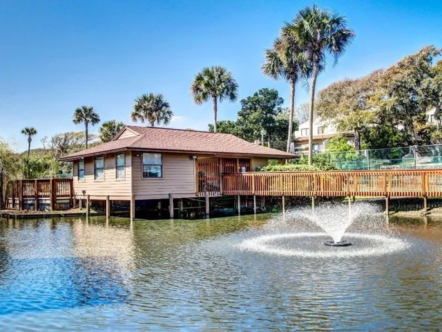 a view of a house with a swimming pool