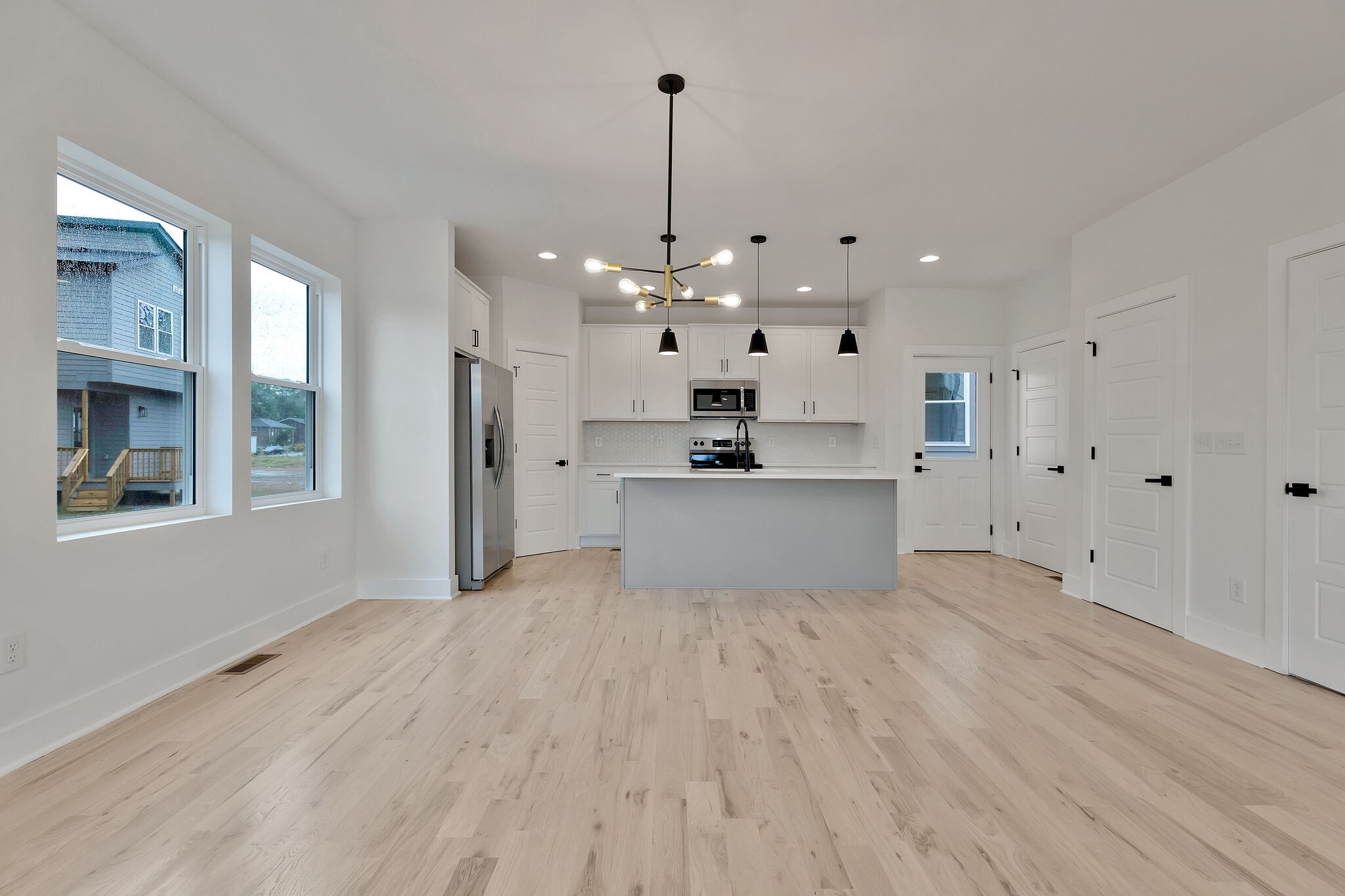 193 Paragon Mills Road Nashville, TN 37211 - Photo 11 of 31 a view of a kitchen with an empty room and window