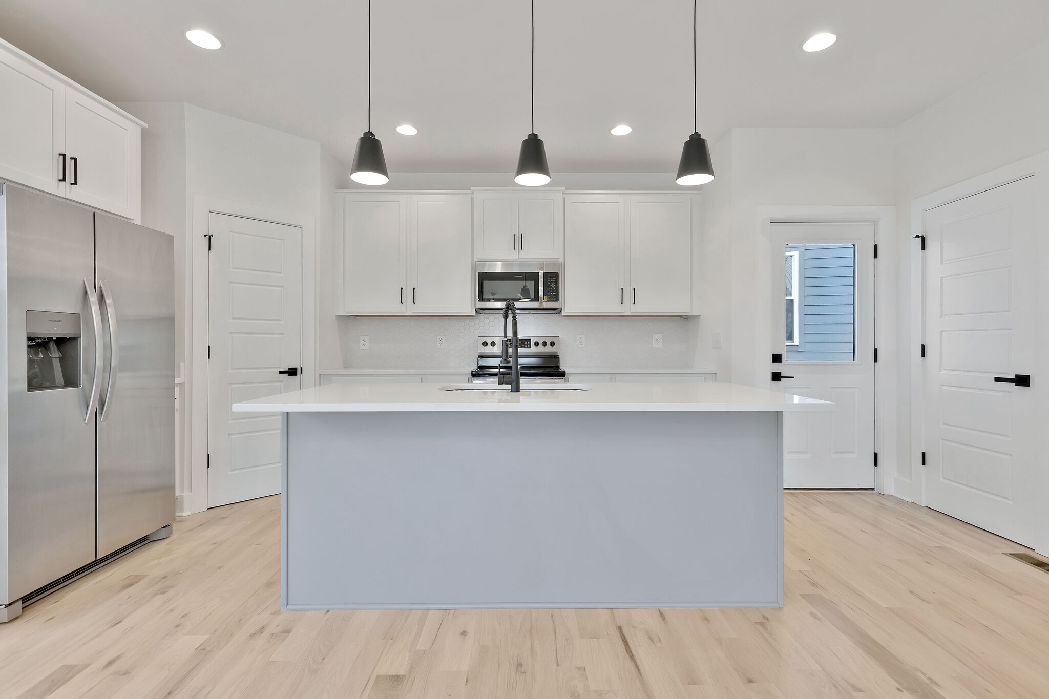 193 Paragon Mills Road Nashville, TN 37211 - Photo 13 of 31 a kitchen with kitchen island a sink stainless steel appliances and cabinets