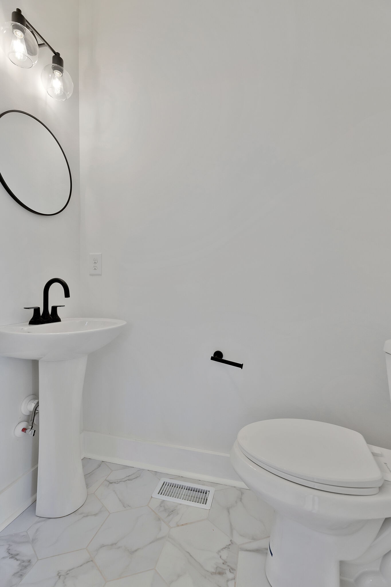 193 Paragon Mills Road Nashville, TN 37211 - Photo 15 of 31 a bathroom with a sink a toilet and a mirror