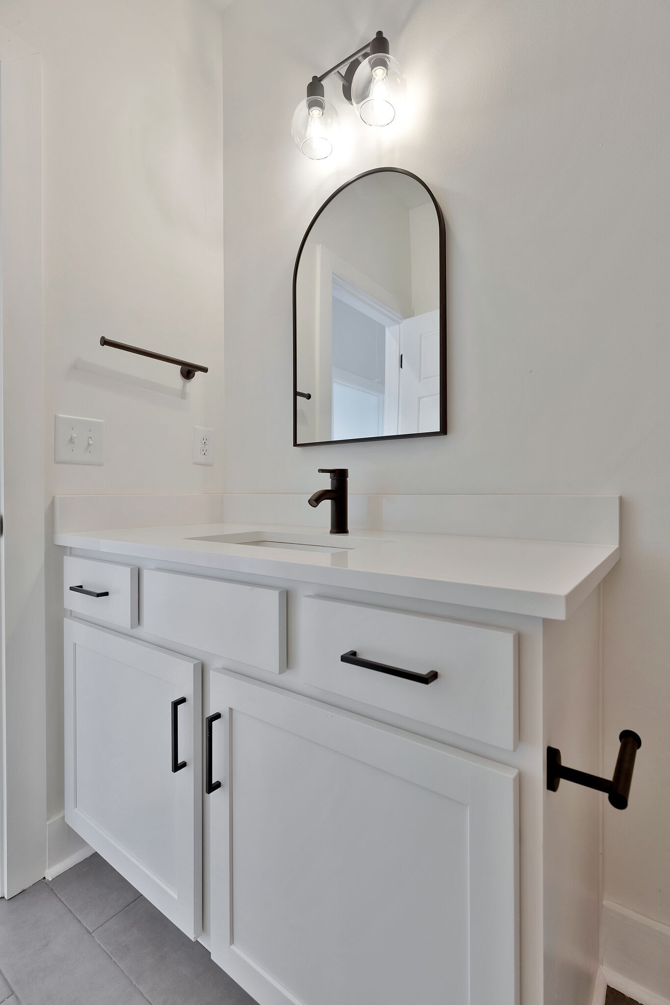 193 Paragon Mills Road Nashville, TN 37211 - Photo 19 of 31 a bathroom with a sink and mirror