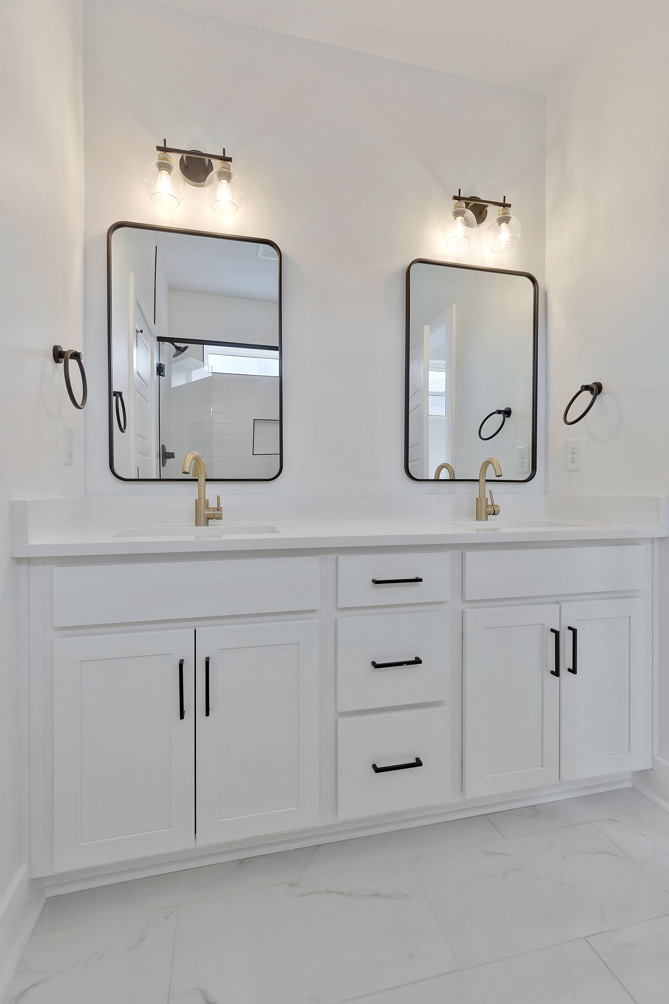 193 Paragon Mills Road Nashville, TN 37211 - Photo 27 of 31 a bathroom with double vanity sinks and a mirror