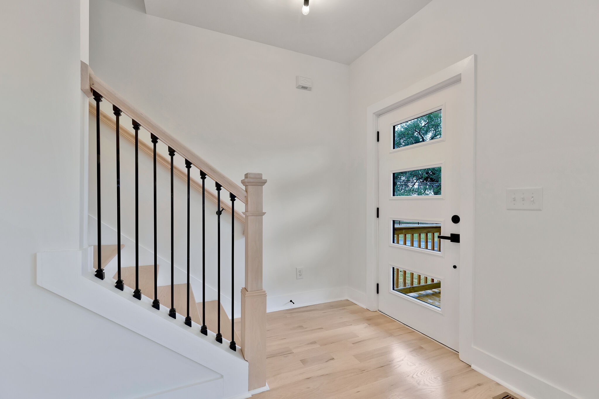 193 Paragon Mills Road Nashville, TN 37211 - Photo 7 of 31 a view of a hallway with a book shelf