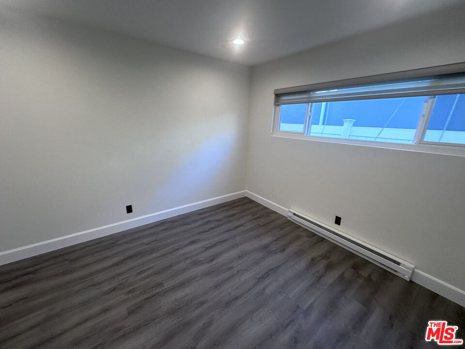2228 20th Street, Unit 2 Santa Monica, CA 90405 - Photo 19 of 43 a view of wooden floor in an empty room