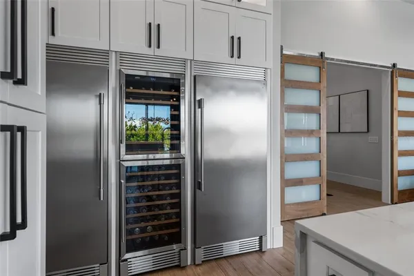 a view of a porch with furniture and a fire pit